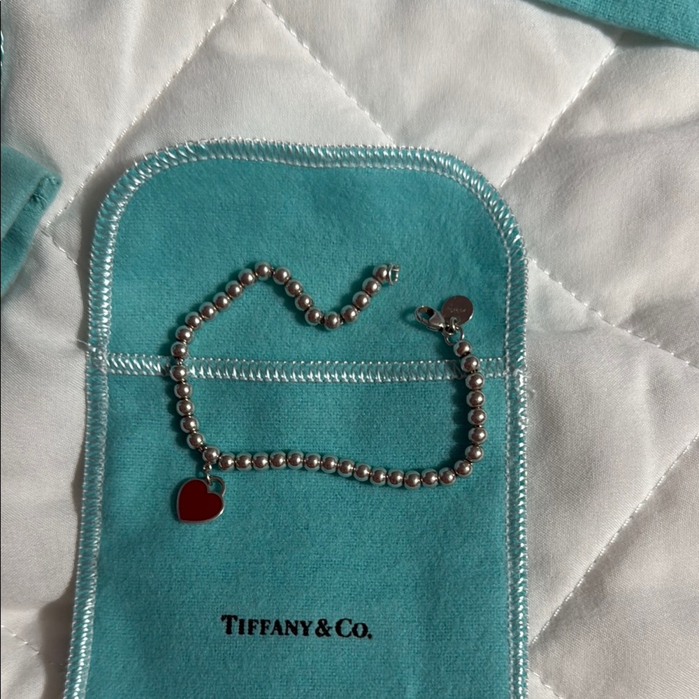 Tiffany & Co. Silver Bracelet with Red Heart Charm